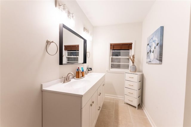 bathroom with vanity and tile patterned floors