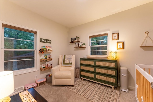 sitting room with light colored carpet