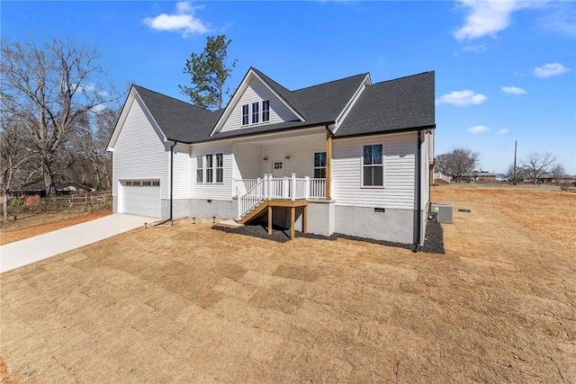 view of front of home with crawl space, a garage, a porch, and concrete driveway