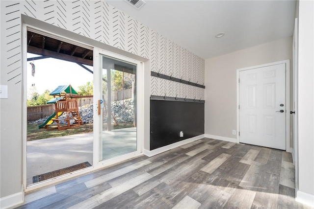 interior space with hardwood / wood-style floors