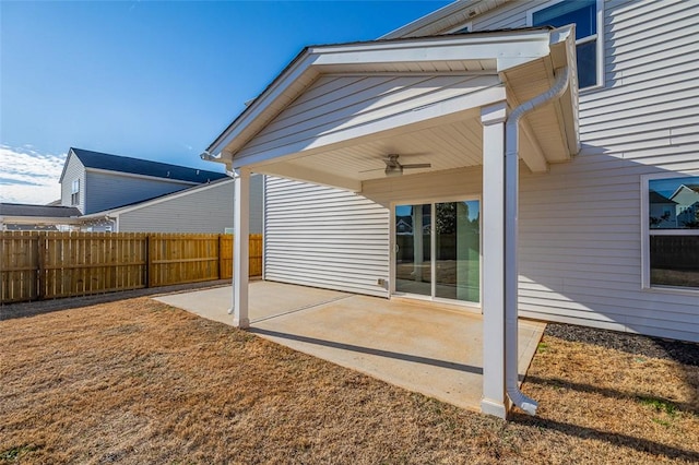 back of house featuring ceiling fan and a patio area