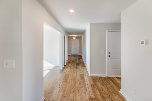 hallway featuring light wood-type flooring