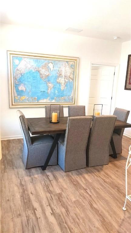 dining room featuring hardwood / wood-style floors