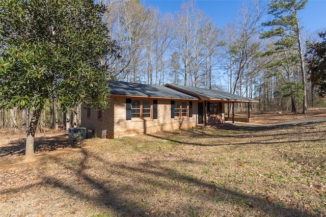 exterior space featuring a front lawn