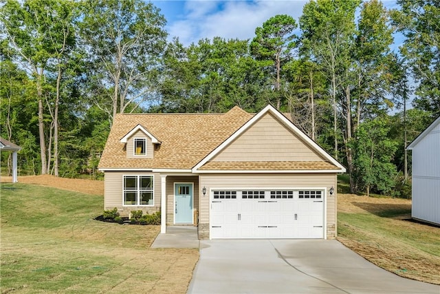 view of front facade featuring a front yard and a garage