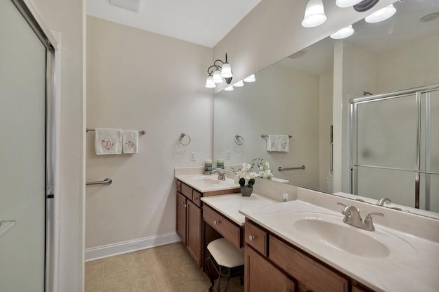 bathroom featuring walk in shower and vanity