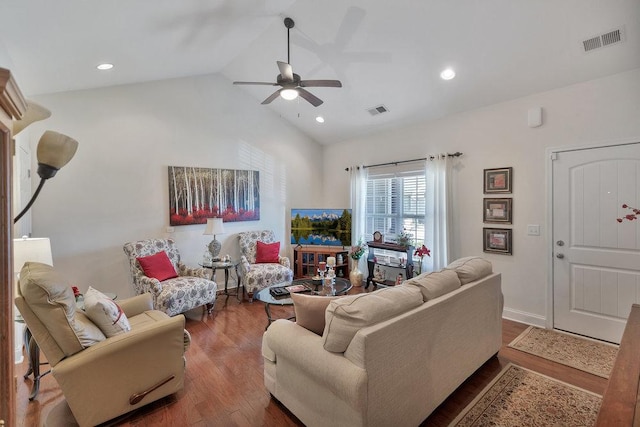 living room featuring ceiling fan, wood-type flooring, and lofted ceiling