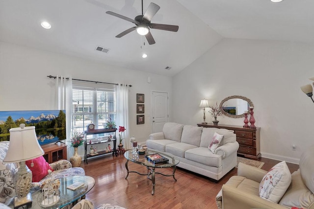 living room featuring lofted ceiling, ceiling fan, and hardwood / wood-style floors