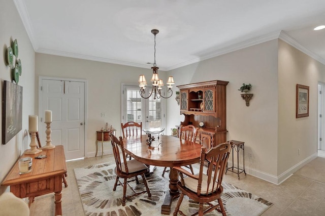 dining area featuring a chandelier and ornamental molding