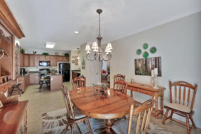 dining area with an inviting chandelier