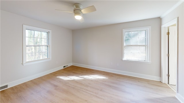 unfurnished room featuring ceiling fan and light hardwood / wood-style floors