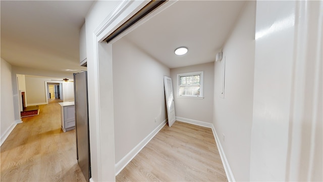 hallway featuring light wood-type flooring