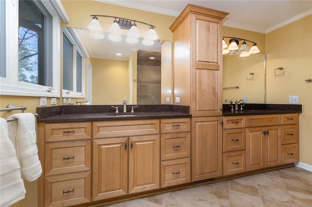 bathroom with vanity and ornamental molding