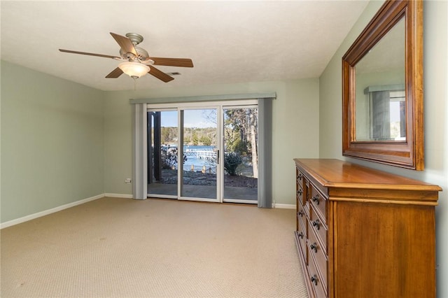 interior space featuring ceiling fan