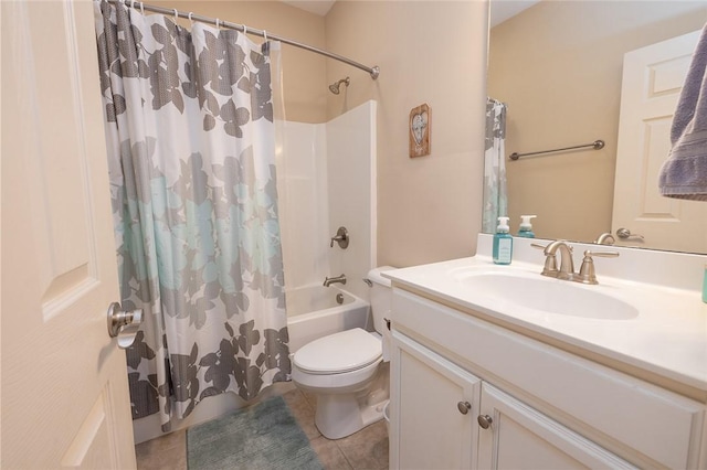 full bathroom with tile patterned flooring, toilet, shower / bath combo with shower curtain, and vanity