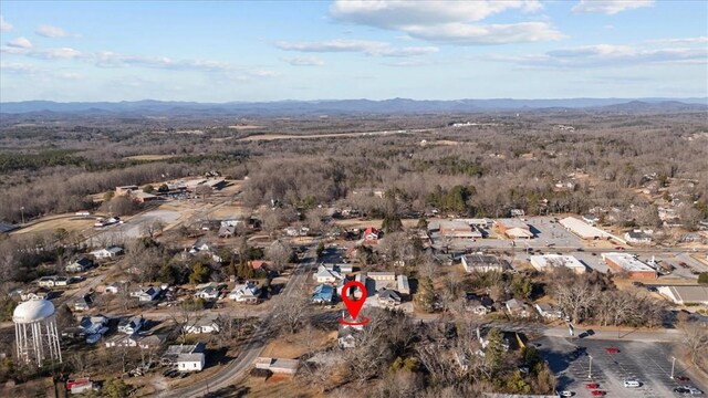 drone / aerial view featuring a mountain view