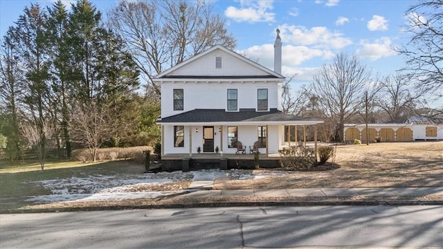 farmhouse featuring a porch