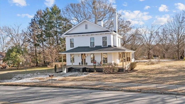 farmhouse-style home with covered porch