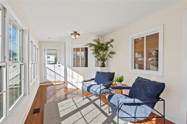 sunroom / solarium with visible vents