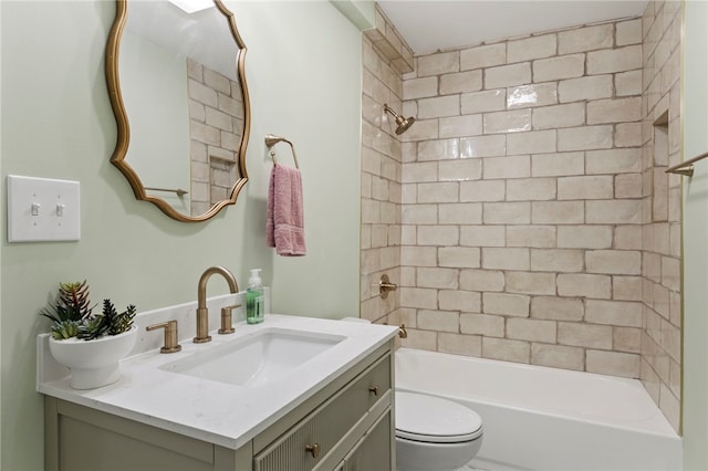 full bathroom featuring toilet, shower / bathing tub combination, and vanity