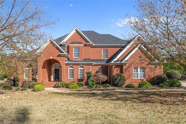 front of property featuring a front lawn