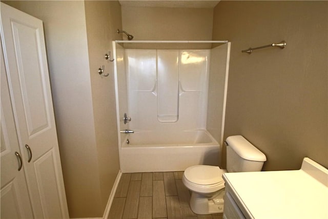 full bathroom with toilet, vanity, and shower / bathing tub combination