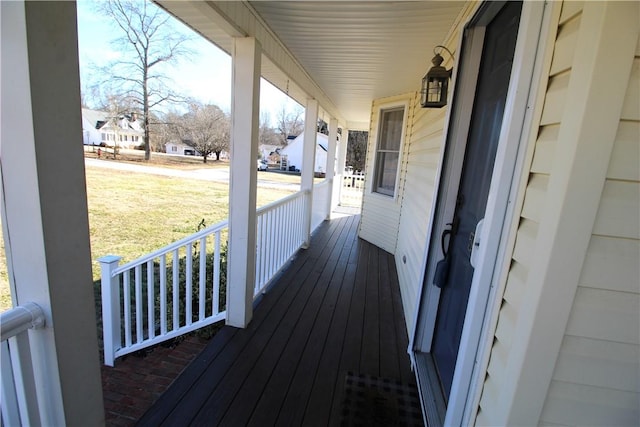 wooden deck featuring a porch