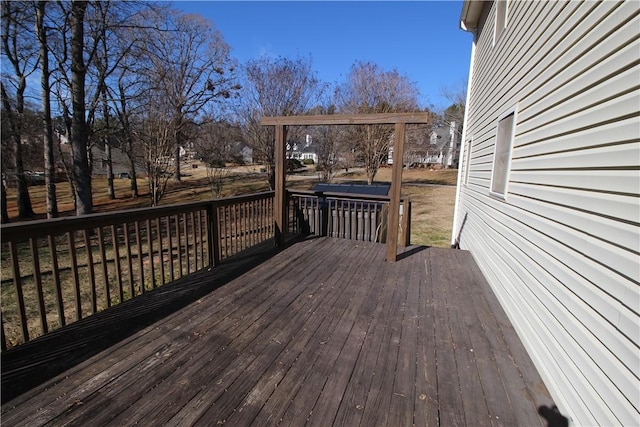 wooden deck with a pergola