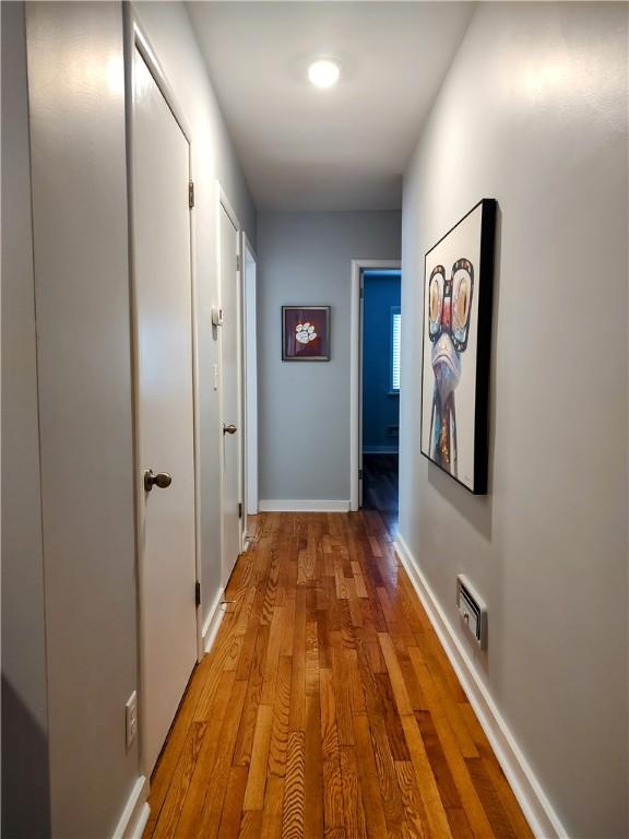 hall featuring light hardwood / wood-style floors