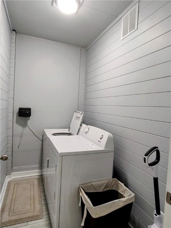 laundry room featuring separate washer and dryer