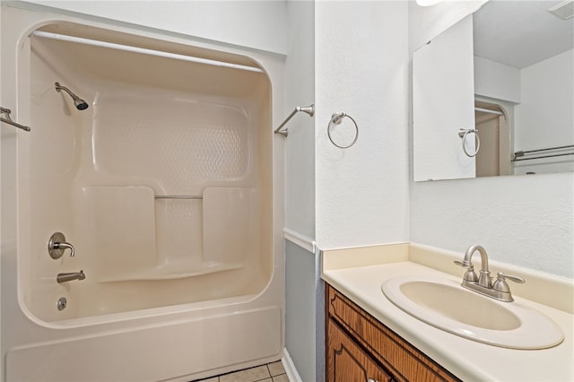 bathroom with shower / bathing tub combination, vanity, and tile patterned flooring