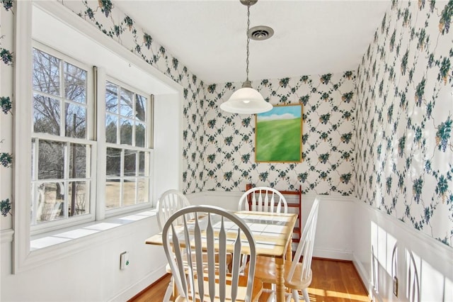 dining room with light wood-type flooring