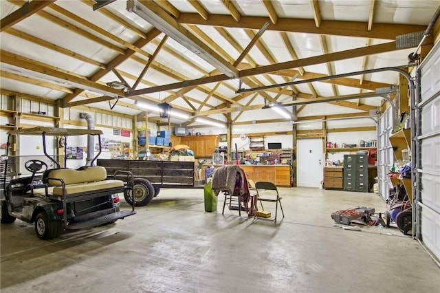 garage with a workshop area