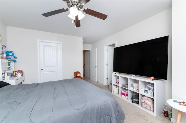 bedroom featuring ceiling fan and carpet flooring