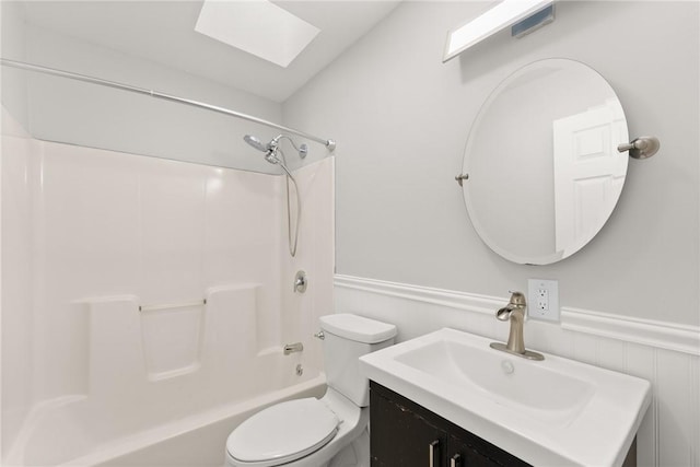 full bathroom with toilet, vanity, and shower / bathing tub combination