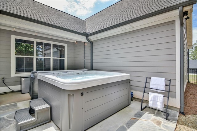 view of patio / terrace featuring a hot tub