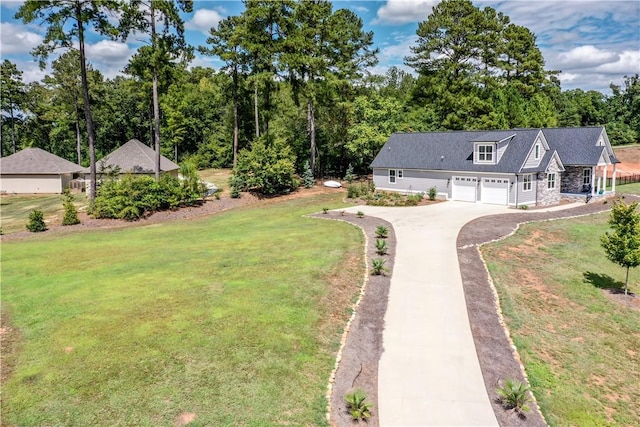 exterior space featuring a front yard and a garage