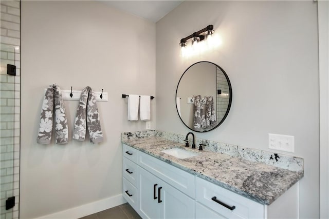 bathroom with vanity and tile patterned flooring