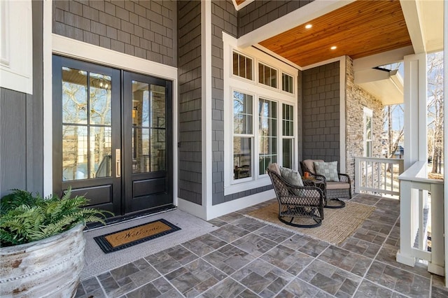 property entrance featuring french doors