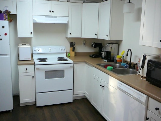 kitchen featuring white cabinets, sink, and white appliances