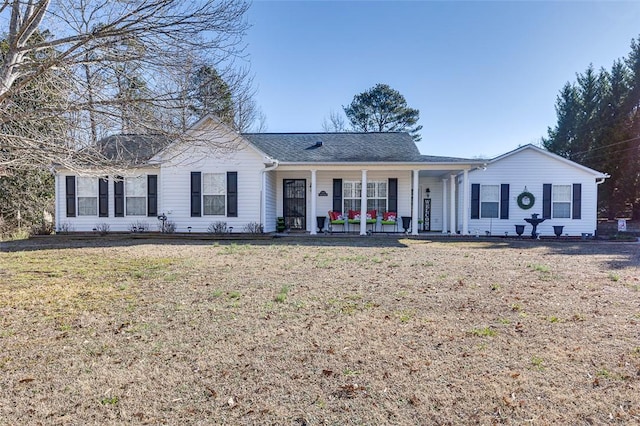 single story home featuring a front yard and a porch