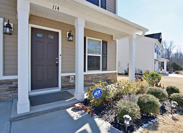 property entrance with a porch