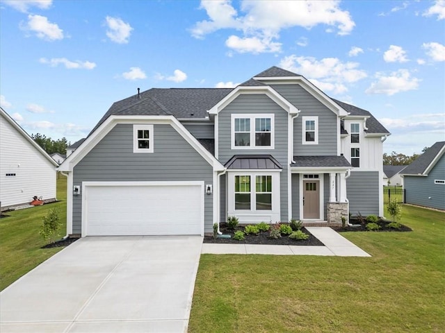 craftsman inspired home with a front yard and a garage