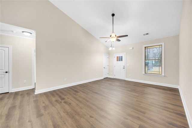 unfurnished living room with ceiling fan, dark hardwood / wood-style floors, and lofted ceiling