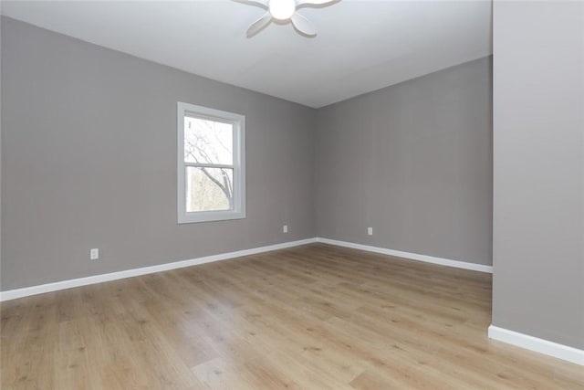 unfurnished room featuring ceiling fan and light hardwood / wood-style flooring