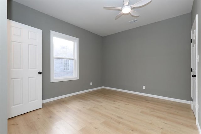 unfurnished bedroom featuring ceiling fan and light hardwood / wood-style flooring