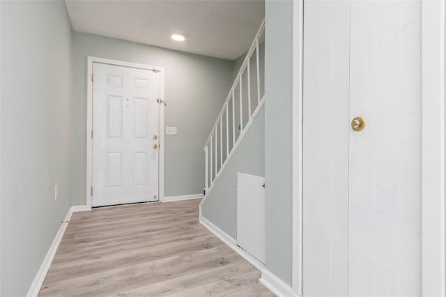 entrance foyer with light hardwood / wood-style flooring