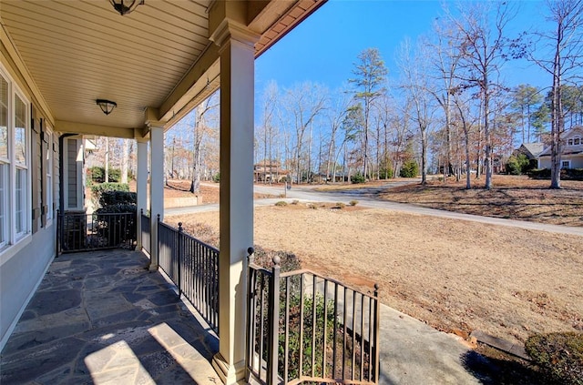 view of patio featuring a porch