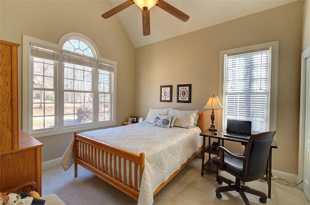 bedroom featuring ceiling fan, light colored carpet, and vaulted ceiling