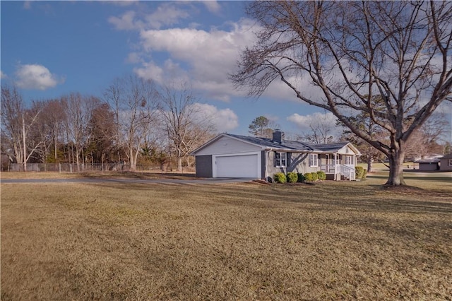 exterior space with a garage and a porch